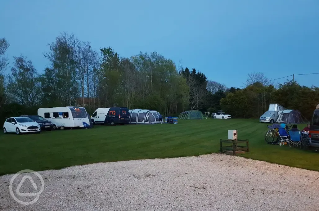 Electric grass pitches at night