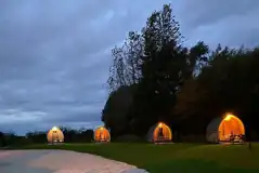 Camping pods at night 