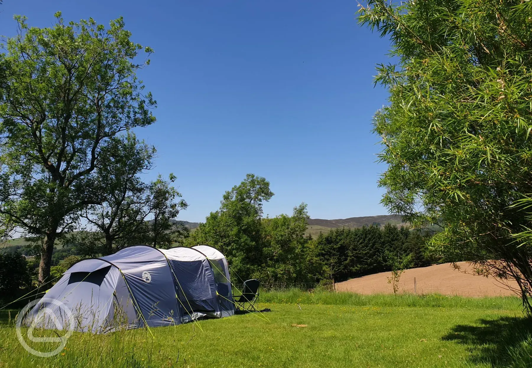 Large non electric grass tent pitches