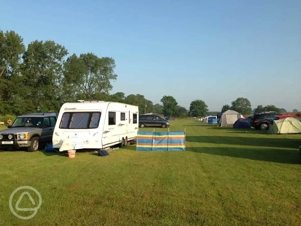 Caravan on grass pitches with a parking space by pitch Caravan on grass pitches with a parking space by pitch