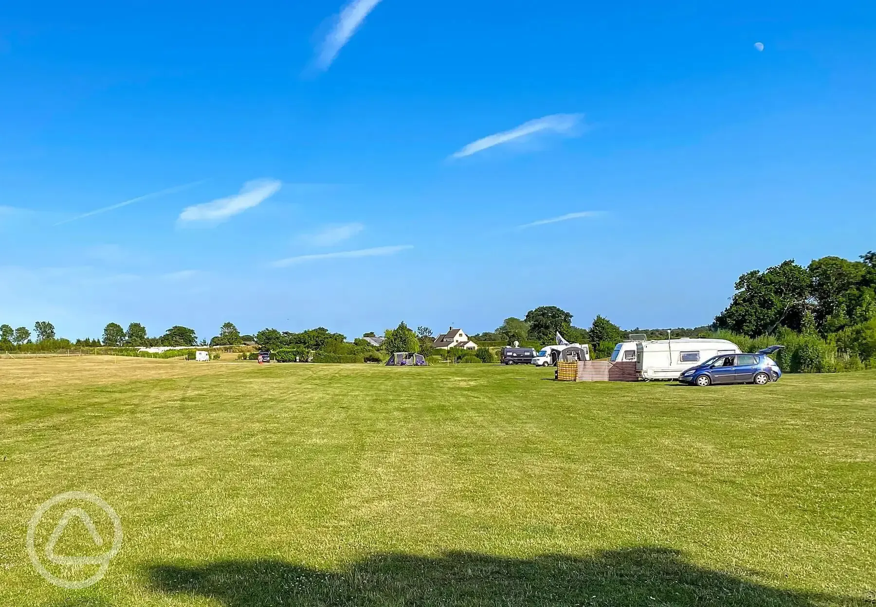 Caravans and motorhomes on grass pitches with awning space Caravans and motorhomes on grass pitches with awning space