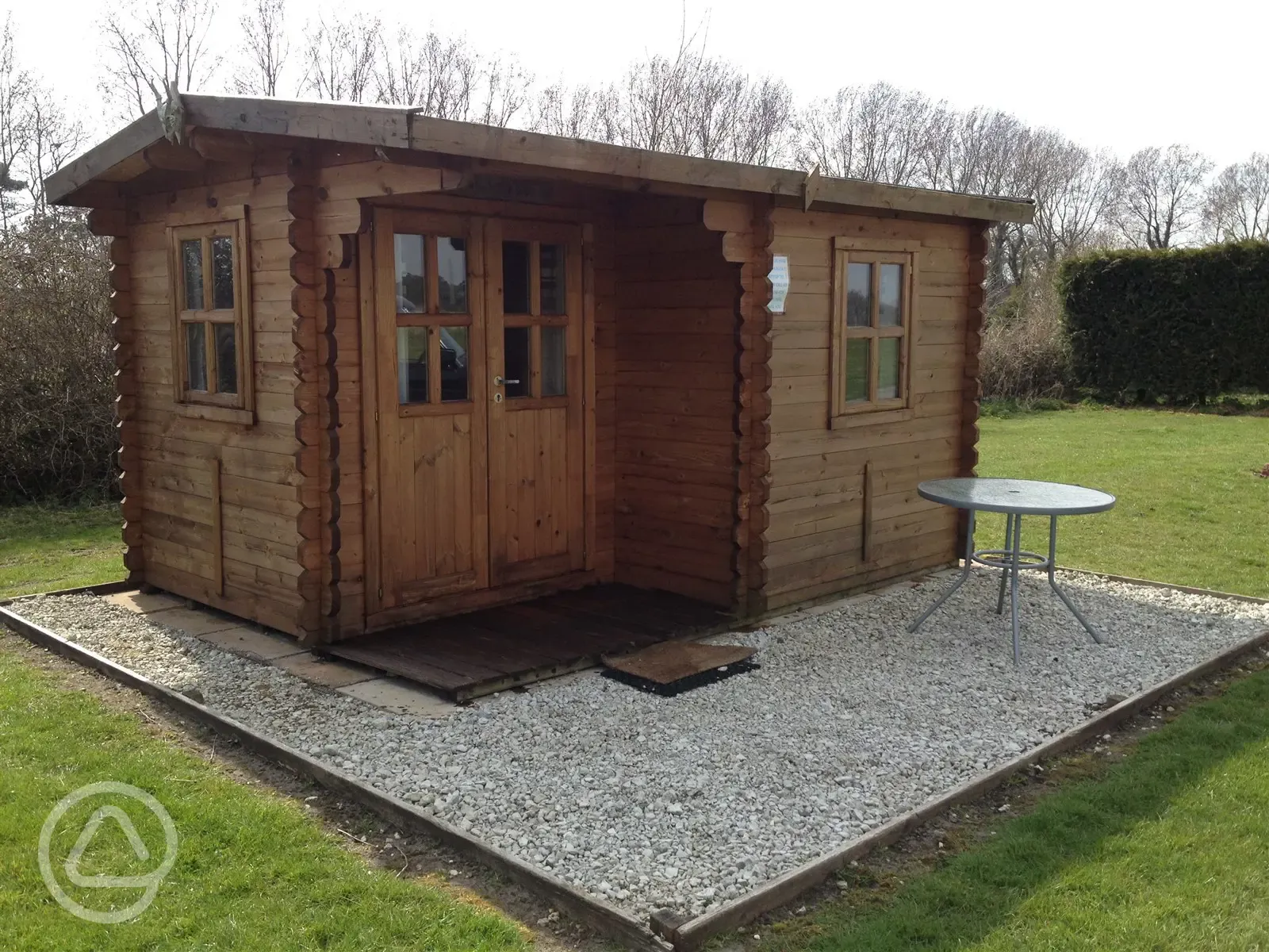 Unfurnished log cabin with outdoor furniture Unfurnished log cabin with outdoor furniture