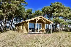 Beach cabin next to Tyninghame Beach on a wide grassy field