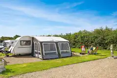 Caravan on fully serviced hardstanding pitches with awning space Caravan on fully serviced hardstanding pitches with awning space