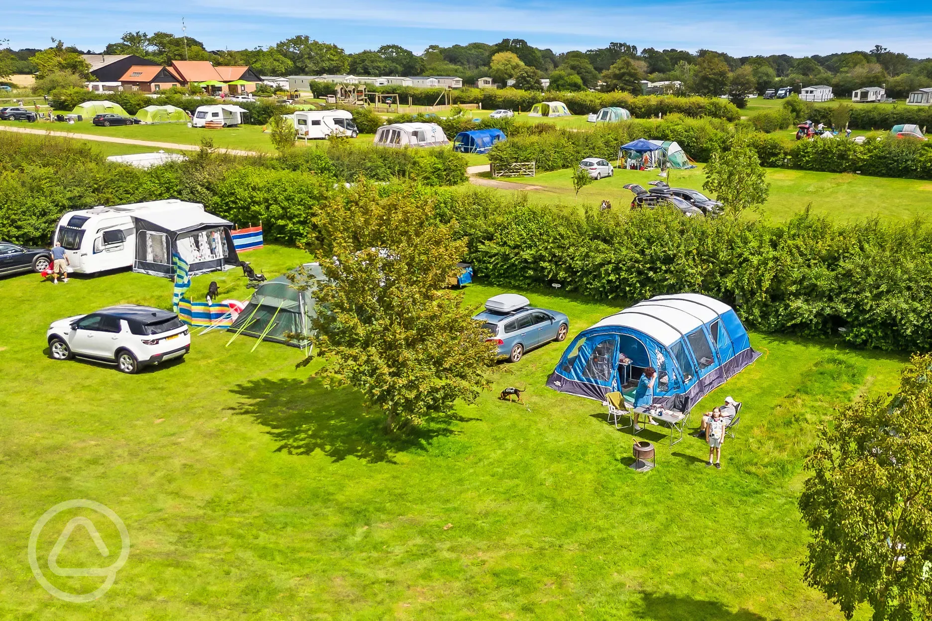 Aerial of non electric grass pitches with awning space
