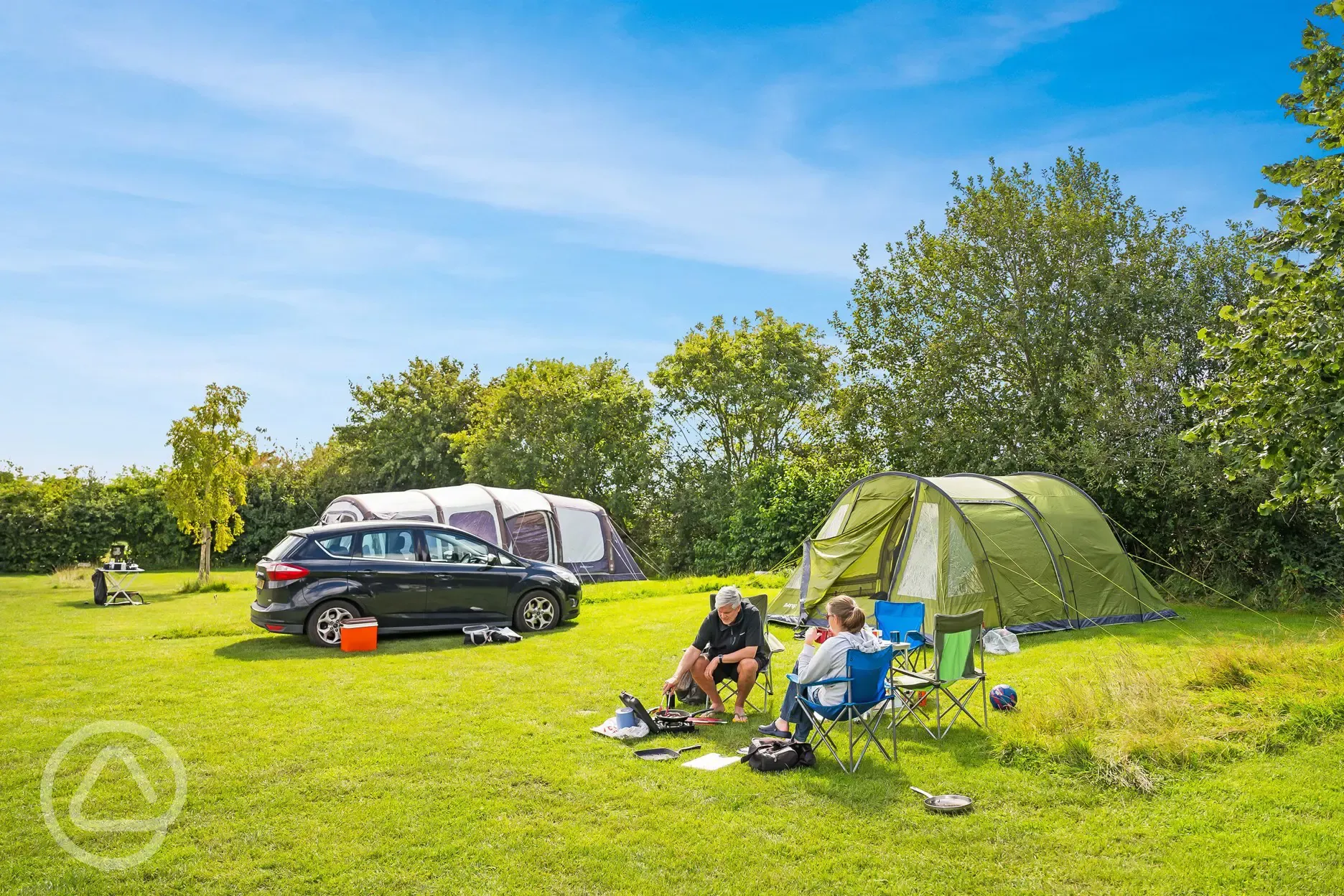 Non electric grass pitches with vehicle space for parking 