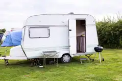 Caravan on grass pitches at Haw Wood Farm Caravan on grass pitches at Haw Wood Farm