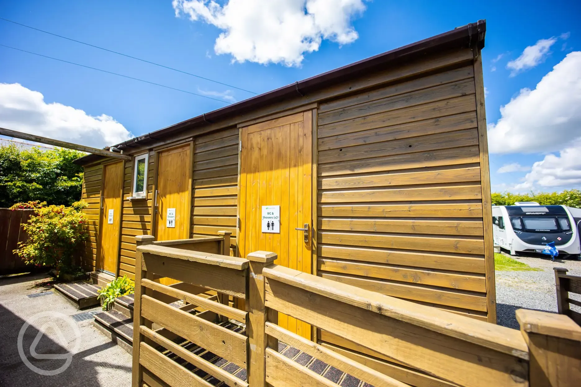 Facilities block with toilets, showers, and family rooms