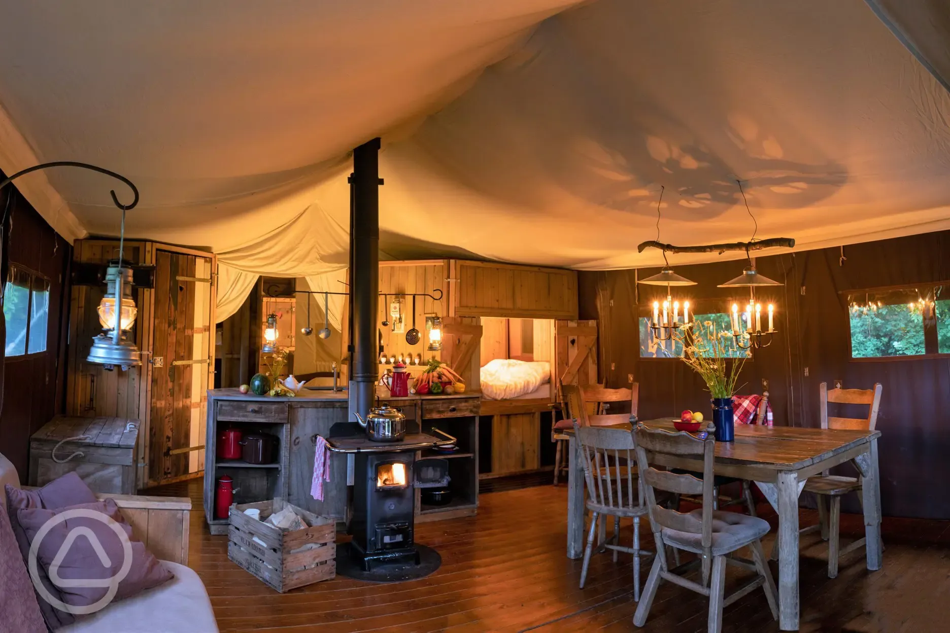 Canvas lodge interior at night