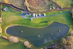 Aerial of Spring Rock Holidays with a large fishing lake