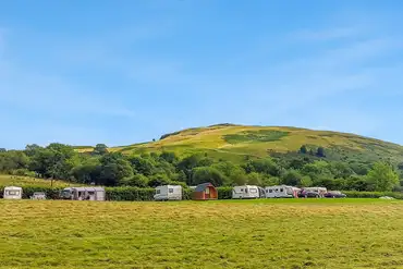 Electric grass pitches with 16 amp hook ups at Spring Rock Holidays