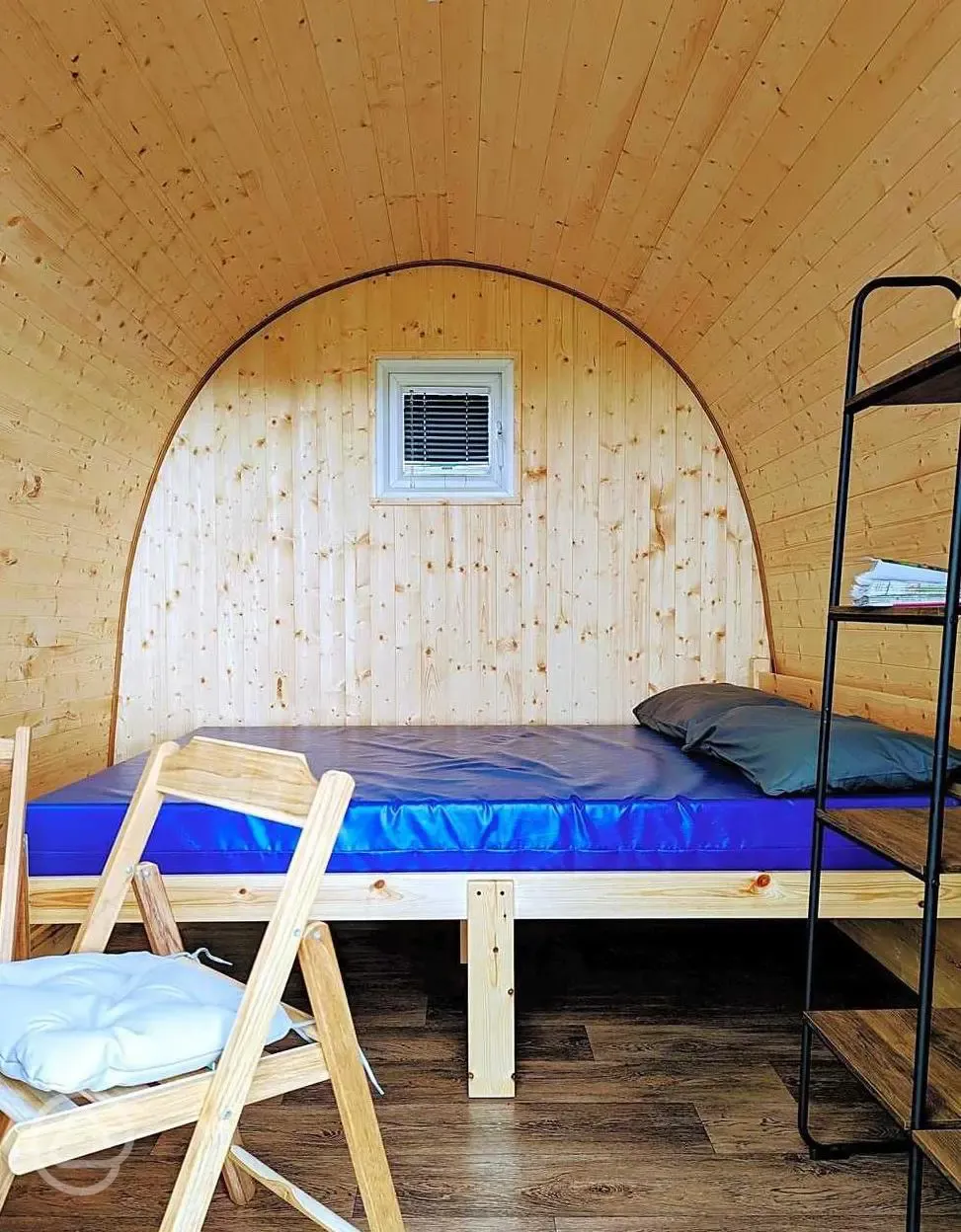 Inside the green camping pods