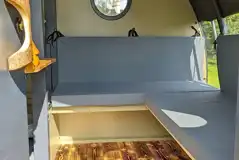 Landpod with a bench seating area