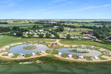Aerial of Fields End Water waterside pitches with fishing lakes
