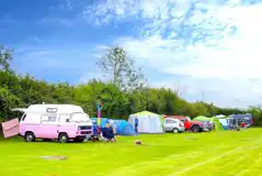 Non electric grass pitches with sunken fire pits