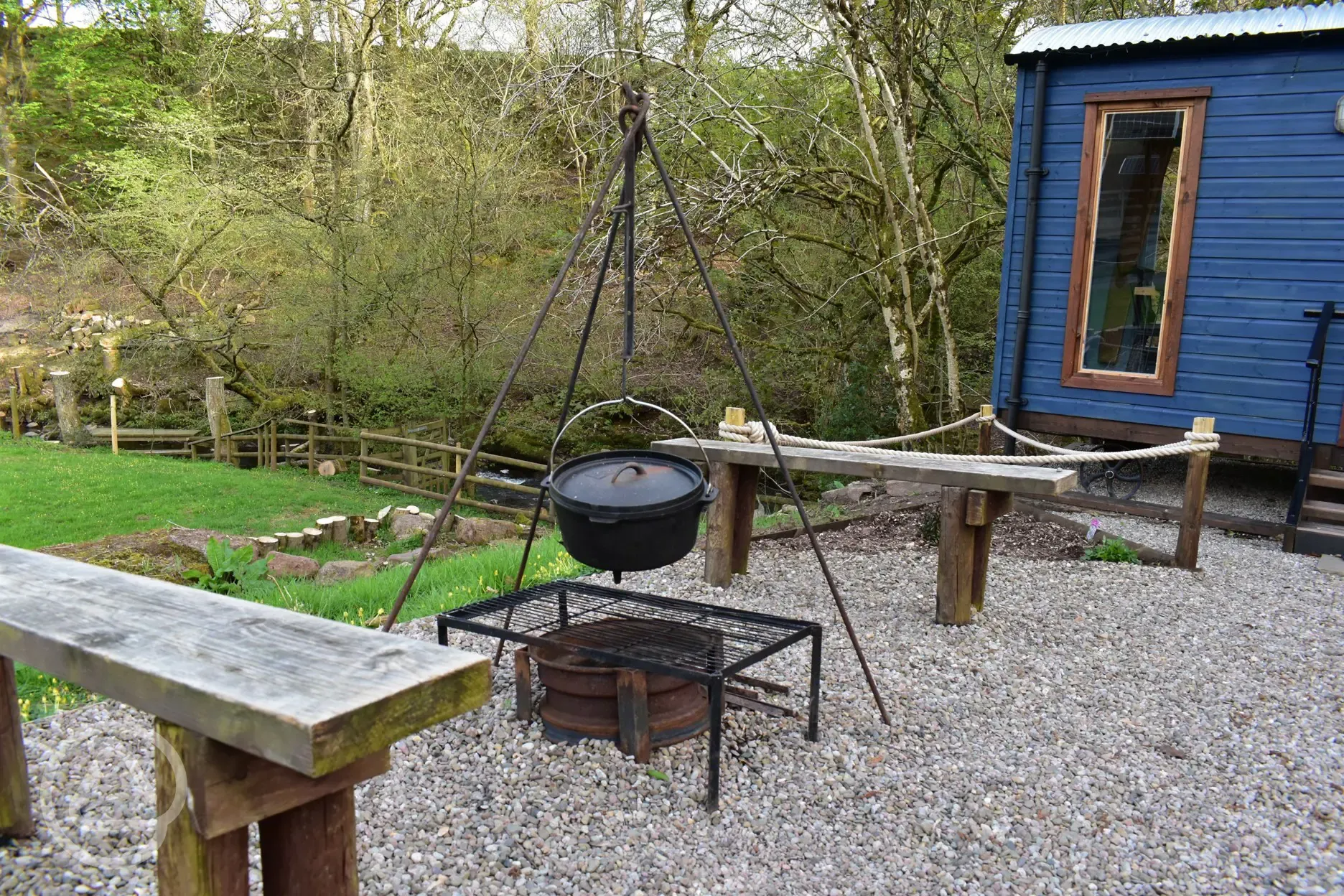 Boutique bell tent fire pit and shepherd's hut and fire pit
