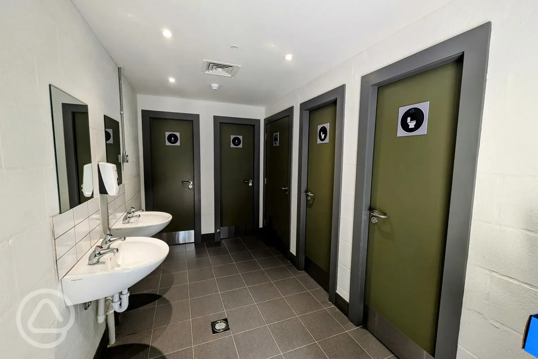 Toilets and showers with underfloor heating