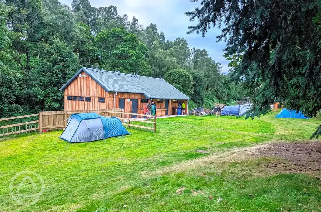 Grass pitches beside the facility block