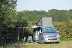 Grass touring pitches with electric or fully serviced options