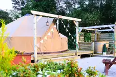 Bell tents with wood-fired hot tubs