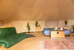 Bell tents with a double bed, futon bed and wood burning stove