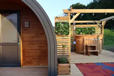 Heated camping pods with hot tub (wood view)