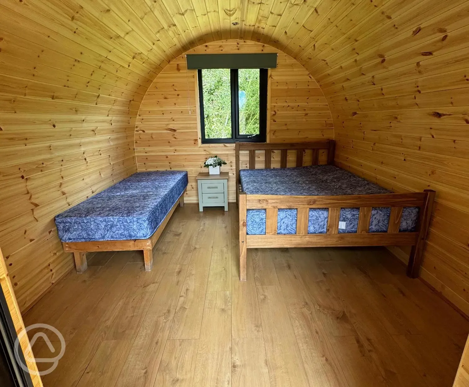 Family pods featuring double bed and single bed