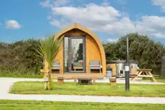 Maple pod exterior with wood fired hot tub Maple pod exterior with wood fired hot tub