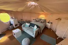 Yurt interior with a king size bed (bedding included)