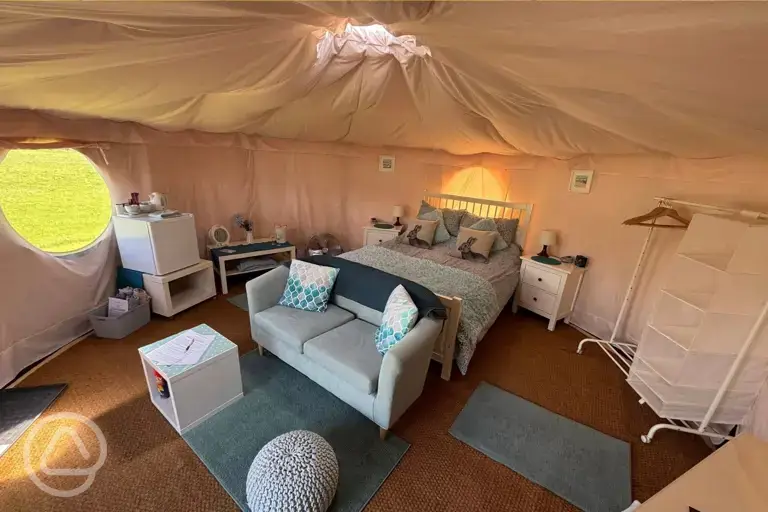 Yurt interior with a king size bed (bedding included)