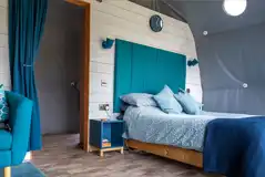 King sized bed in the adult only glamping dome (bedding included)