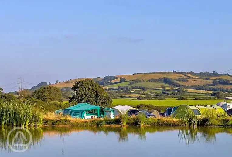 Camping field by the fishing pond