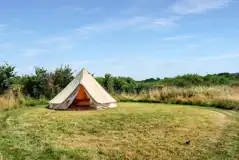 Bell tent in a mown circular pitch