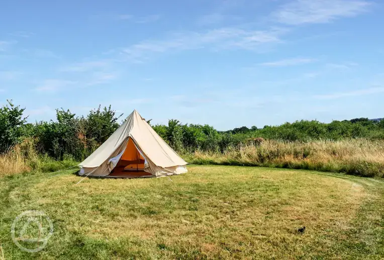 Bell tent in a mown circular pitch