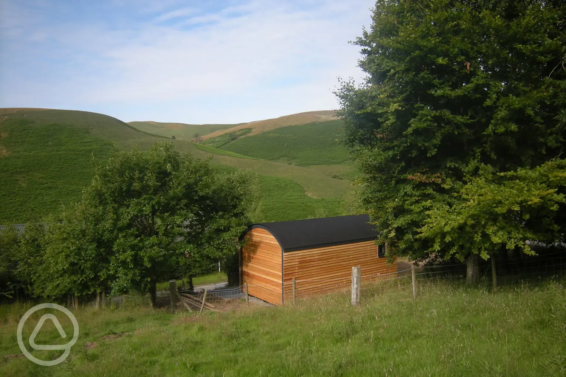 View of hills from above campsite, with shepherd's hut