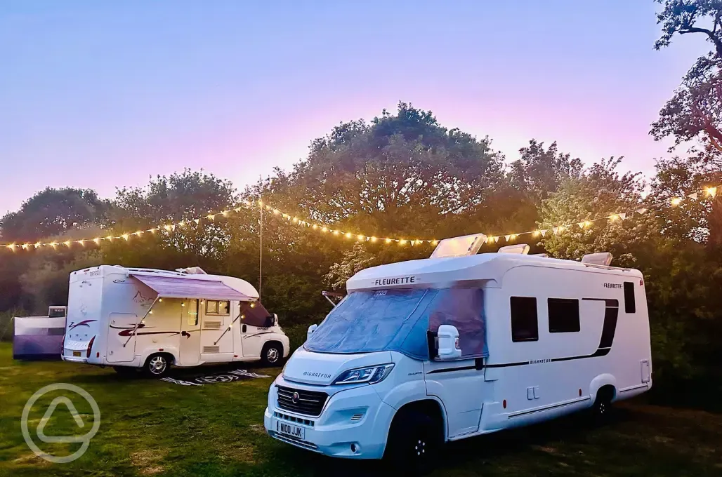 Electric grass pitches at dusk