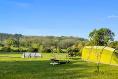 Meadow non electric grass pitches with fire pits for hire