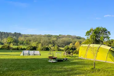 Meadow non electric grass pitches with fire pits for hire
