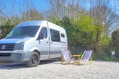 Campervan on an electric hardstanding pitch with a 16 amp hook up