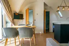 Side entry pod dining area and TV Side entry pod dining area and TV