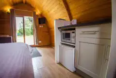 Camping mega pods mini kitchen with a fridge, microwave and kettle Camping mega pods mini kitchen with a fridge, microwave and kettle