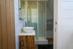 Side entry pod ensuite with a shower and toilet Side entry pod ensuite with a shower and toilet