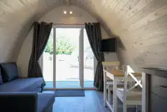Elite pod dining area and sofa with a TV Elite pod dining area and sofa with a TV