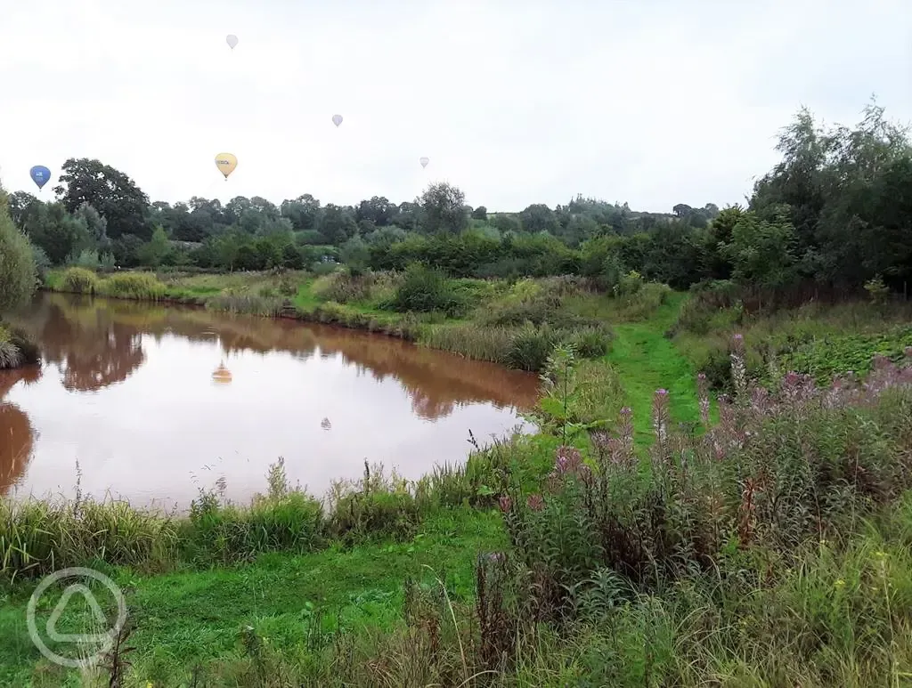 lake with hot air balloon