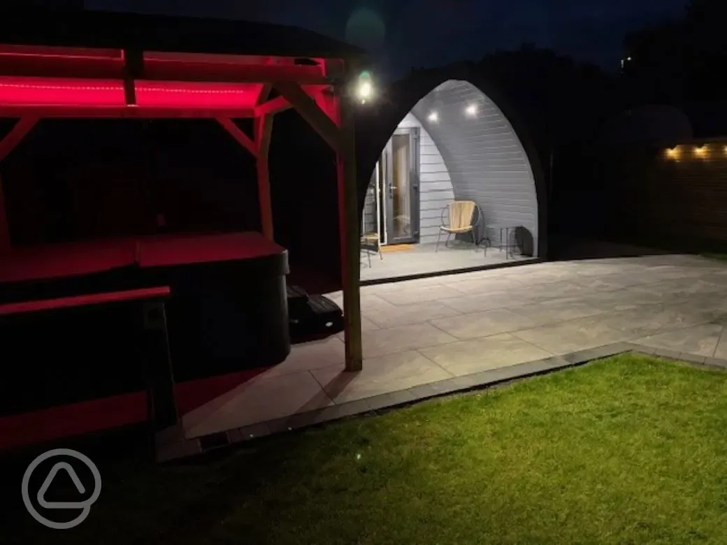 Ensuite glamping pod at night 