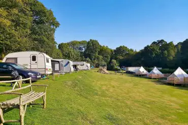 Electric grass 10m x 8m pitches and bell tents at Bluebell Coppice Park