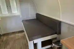 Beds and cooking area in the superior camping pod Beds and cooking area in the superior camping pod