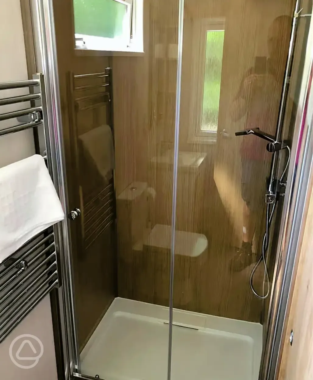 Glamping pod bathroom with a shower, sink and toilet (bring or hire towels)