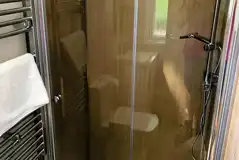 Glamping pod bathroom with a shower, sink and toilet (bring or hire towels) Glamping pod bathroom with a shower, sink and toilet (bring or hire towels)