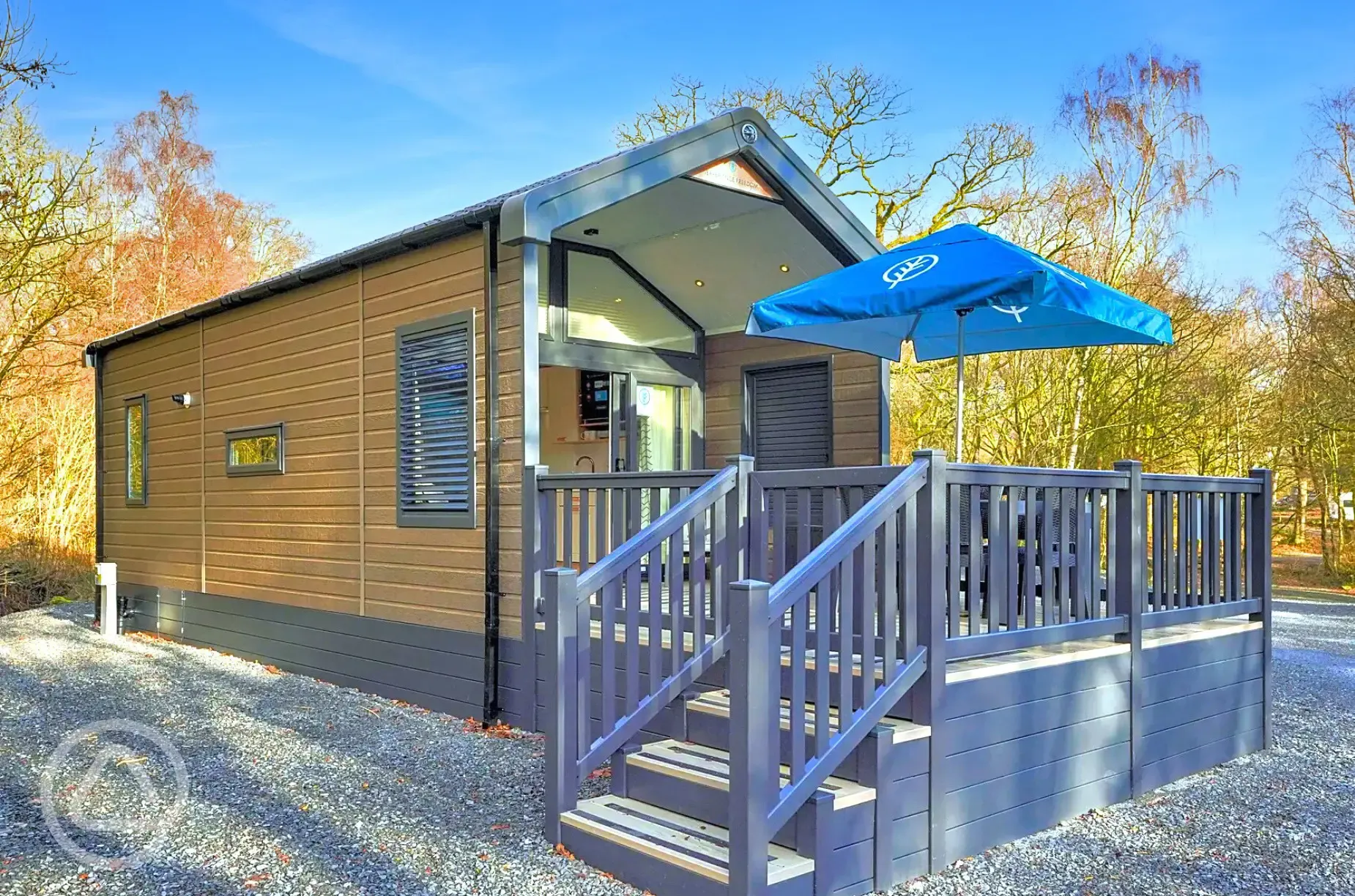 Ensuite glamping cabins with step access and private decks with seating